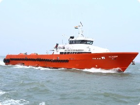 Orange crew boat under way